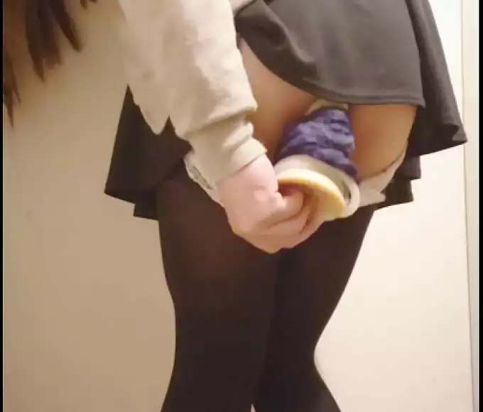 Experience the Luscious Allure of a Japanese Enchantress in a Public Changing Room: Masturbating with a Dildo!